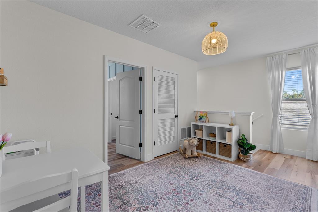 113 Camilla Road DeLand, FL 32724 - Photo 26 of 54 a view of empty room with wooden floor and window