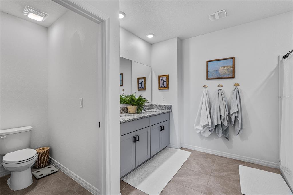 113 Camilla Road DeLand, FL 32724 - Photo 30 of 54 a bathroom with a toilet sink and tub