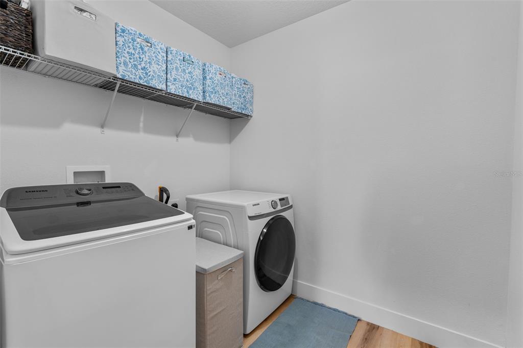 113 Camilla Road DeLand, FL 32724 - Photo 37 of 54 a utility room with dryer and washer