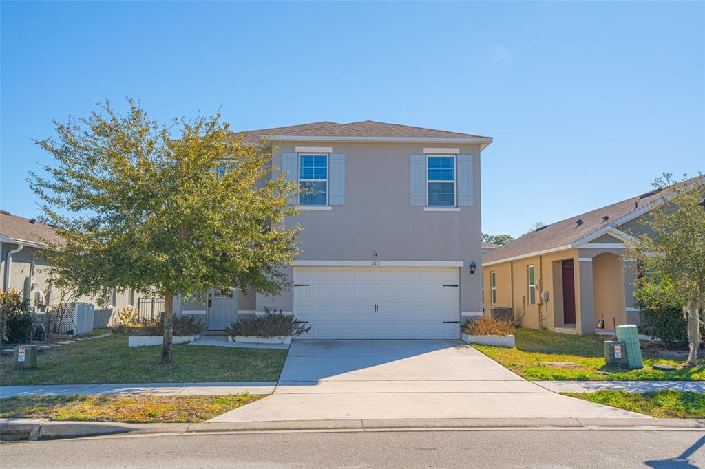 113 Camilla Road DeLand, FL 32724 - Photo 48 of 54 a view of a house with a swimming pool and a yard