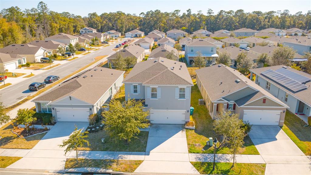 113 Camilla Road DeLand, FL 32724 - Photo 49 of 54 an aerial view of a house with a garden