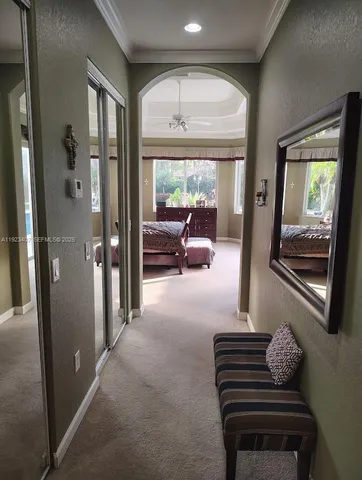 a bathroom with a granite countertop sink a toilet and shower