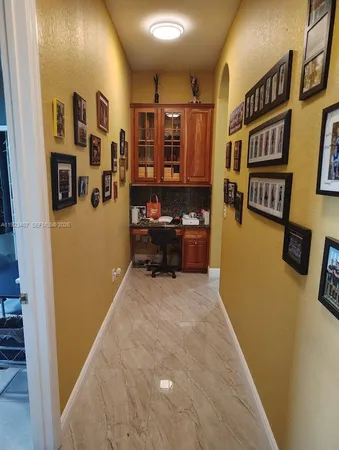 a view of livingroom with furniture and window
