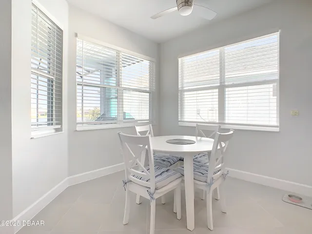 a bedroom with a bed and a night stand