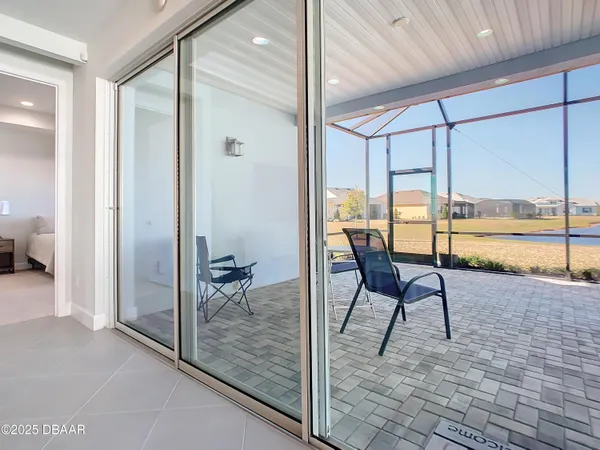 a view of kitchen with furniture and a potted plant