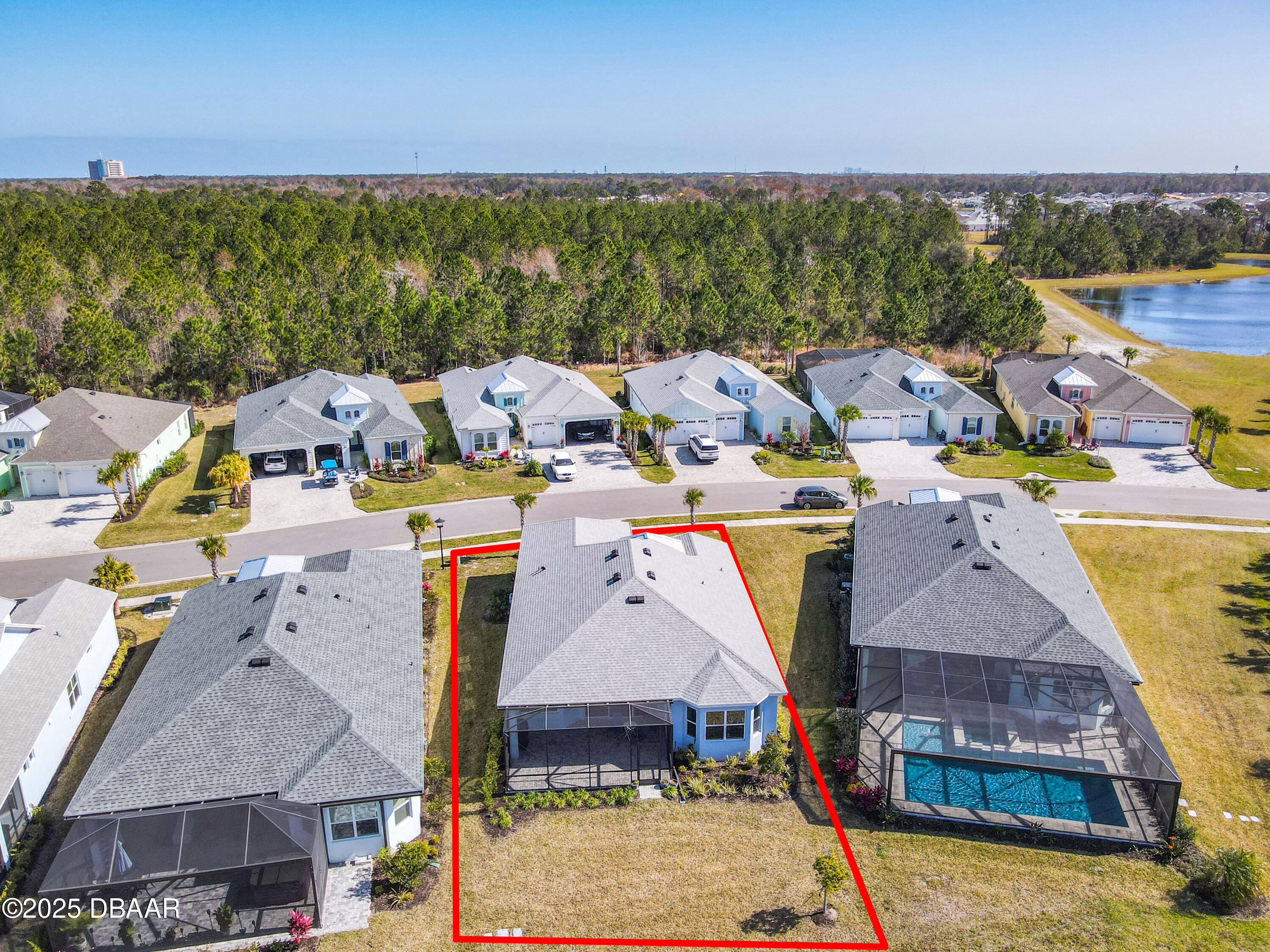 205 Cheeseburger Drive Daytona Beach, FL 32124 - Photo 48 of 79 an aerial view of a houses with a swimming pool