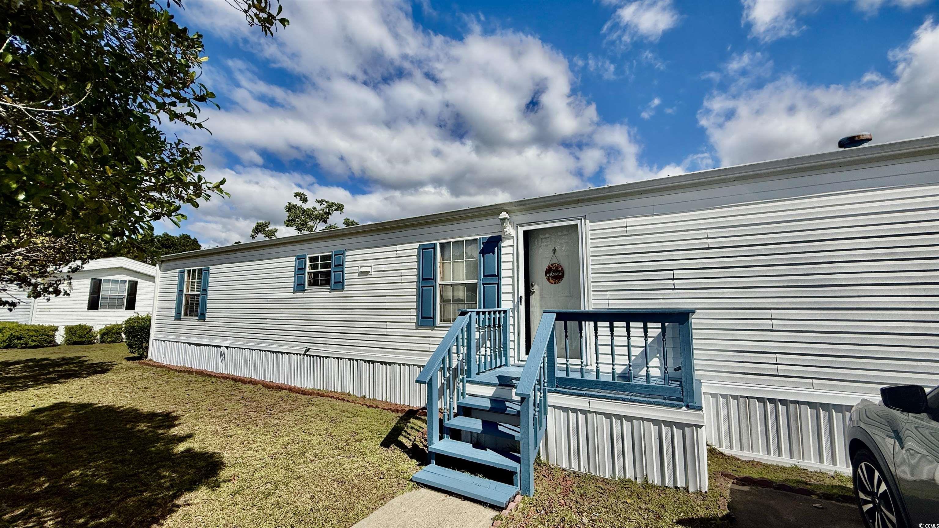 1056 Hunter Way Conway, SC 29526 - Photo 2 of 37 View of front of home with a front yard and driveway