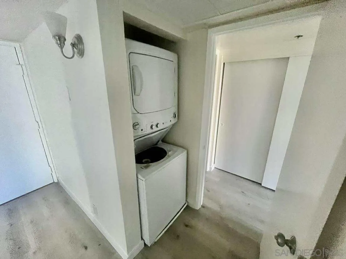a utility room with a washer and dryer