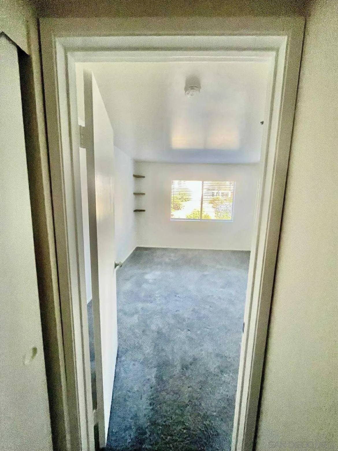 3980 Faircross Place, Unit 23 San Diego, CA 92115 - Photo 15 of 21 a view of livingroom and window
