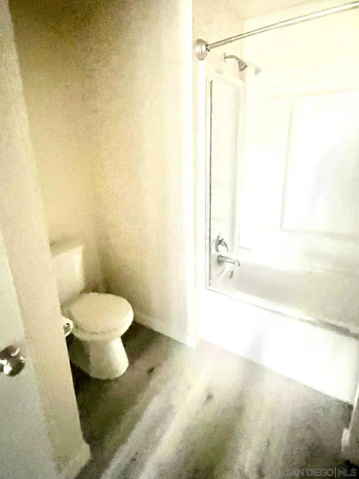 3980 Faircross Place, Unit 23 San Diego, CA 92115 - Photo 18 of 21 a bathroom with a toilet and a bathtub