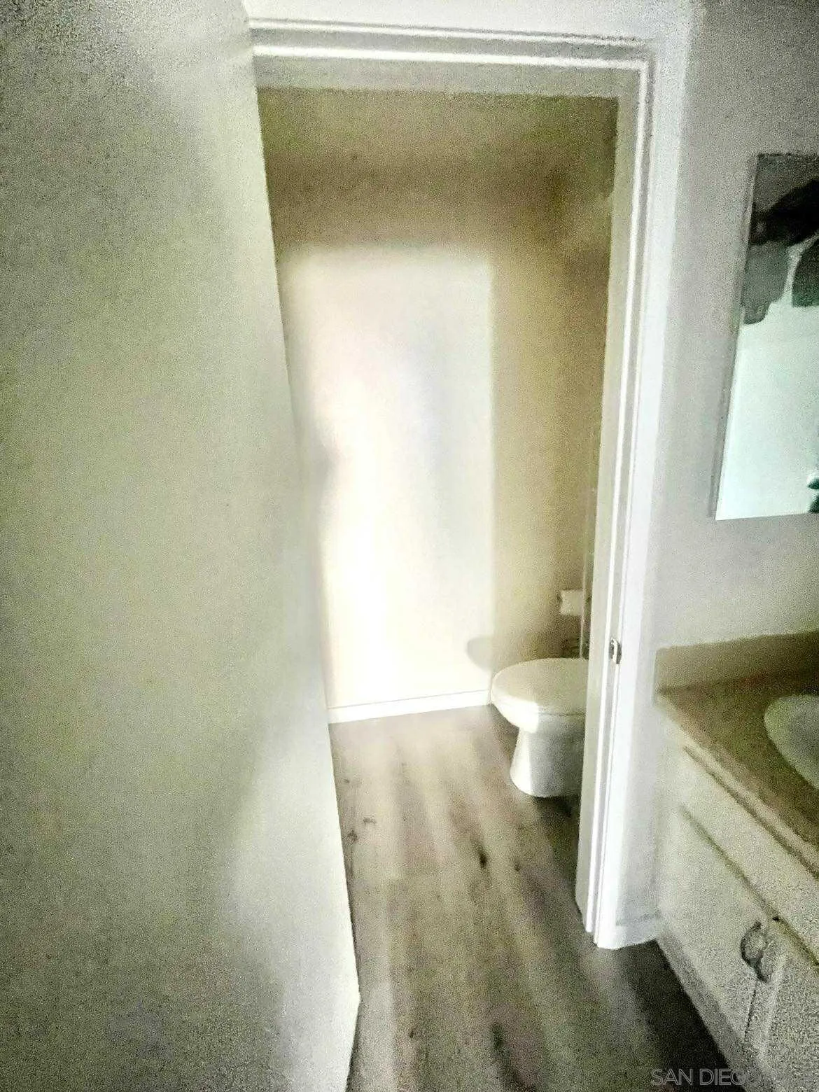 3980 Faircross Place, Unit 23 San Diego, CA 92115 - Photo 19 of 21 view of a bathroom with a sink and toilet