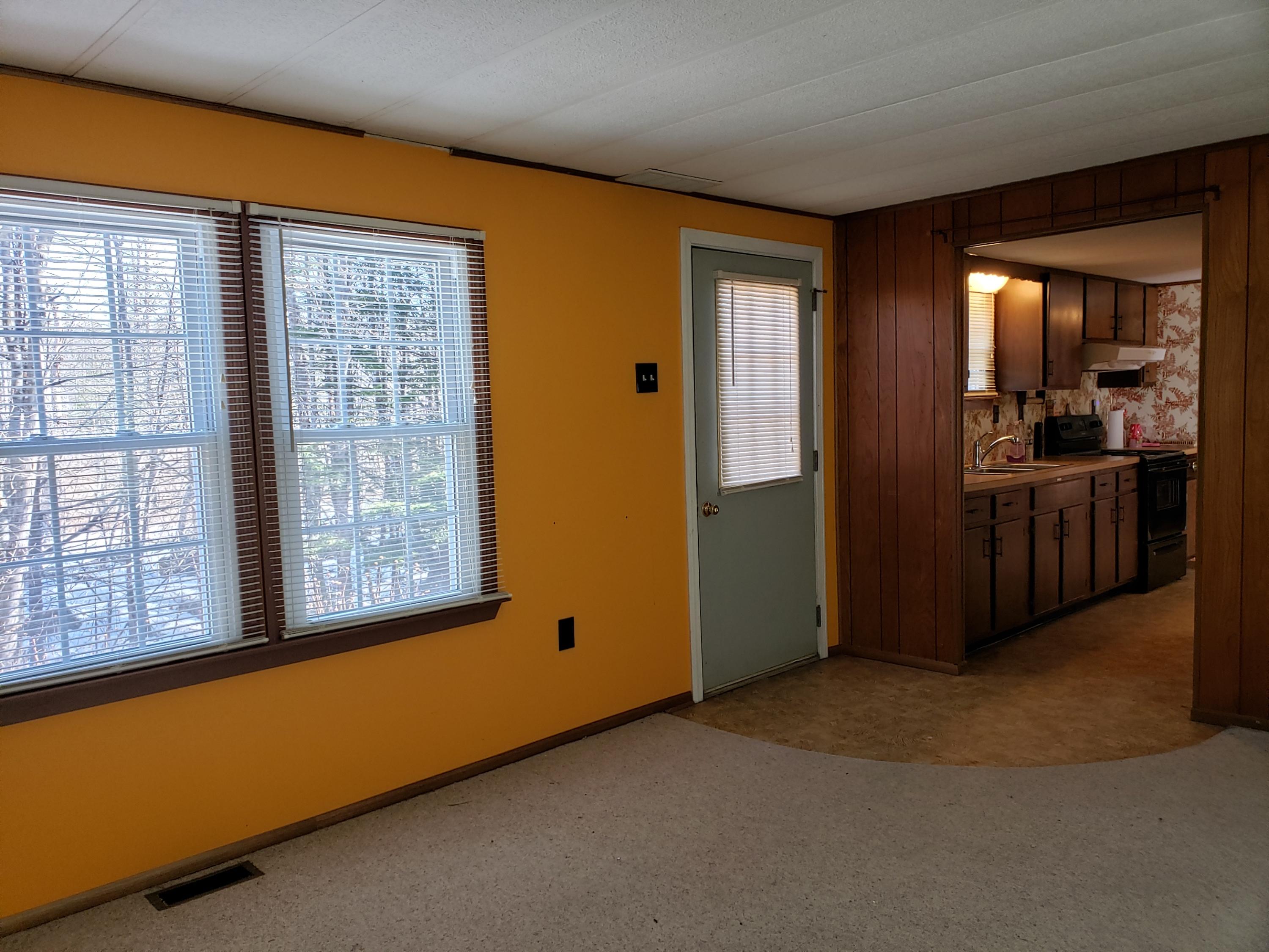 9 Duck Pond Road Harrison, ME 04040 - Photo 7 of 14 Living rm to kitchen