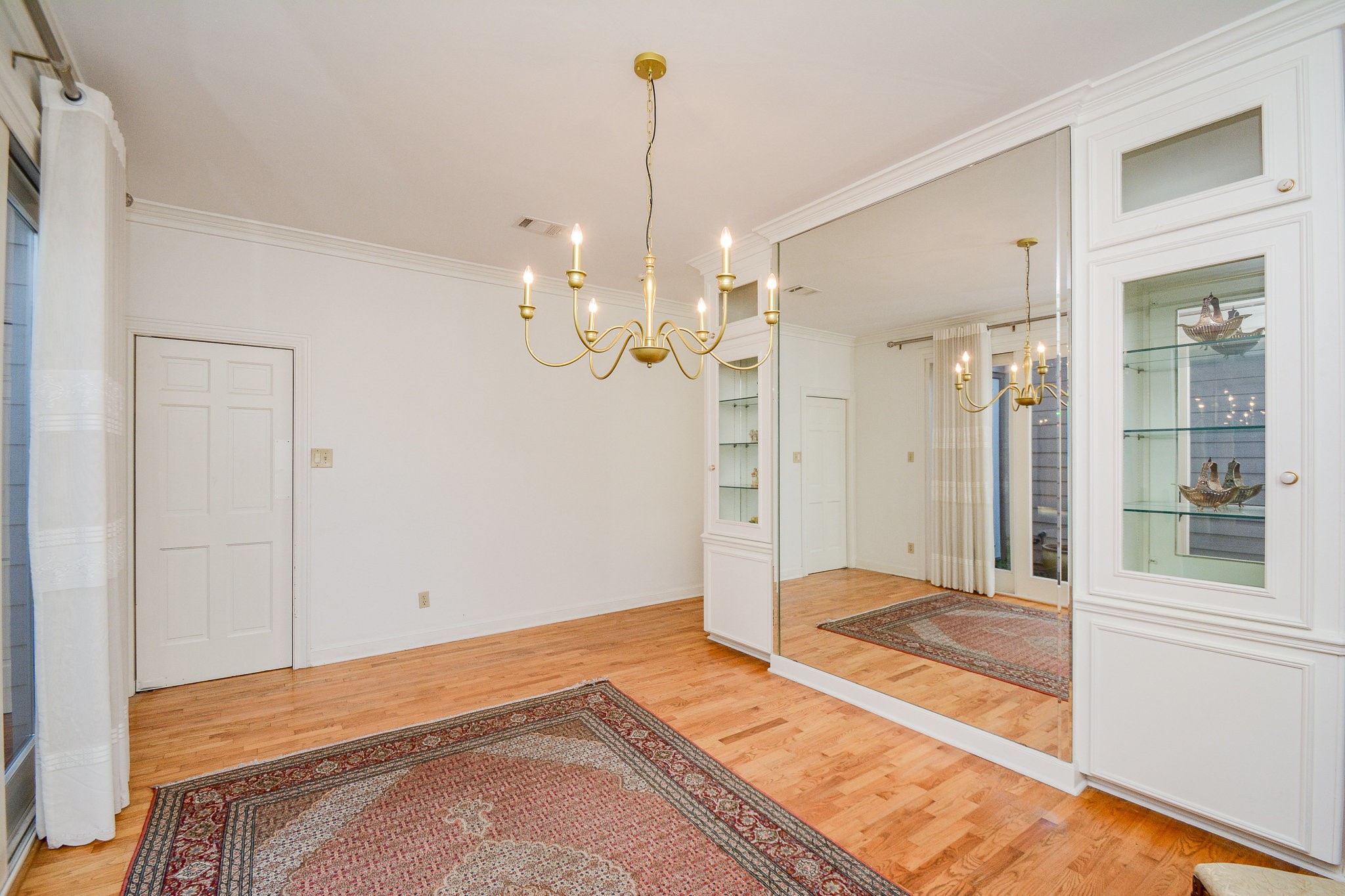 9518 Bayou Brook Street Houston, TX 77063 - Photo 5 of 20 Dining room area with windows creating natural light and beautiful scenery.