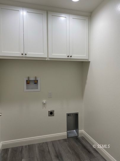 1136 West Boston Avenue Ridgecrest, CA 93555 - Photo 9 of 23 a view of cabinets and wooden floor