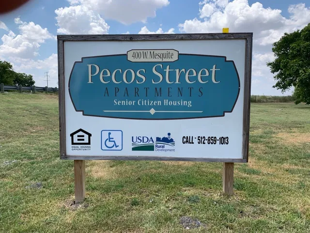 a sign broad on wooden wall