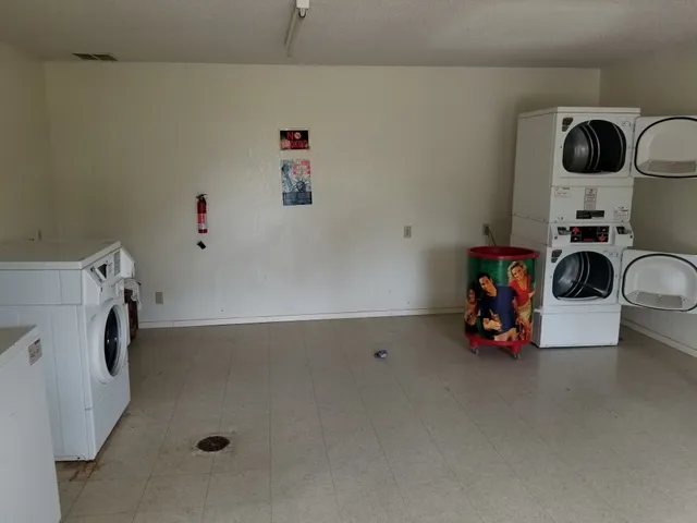 a utility room with dryer and washer