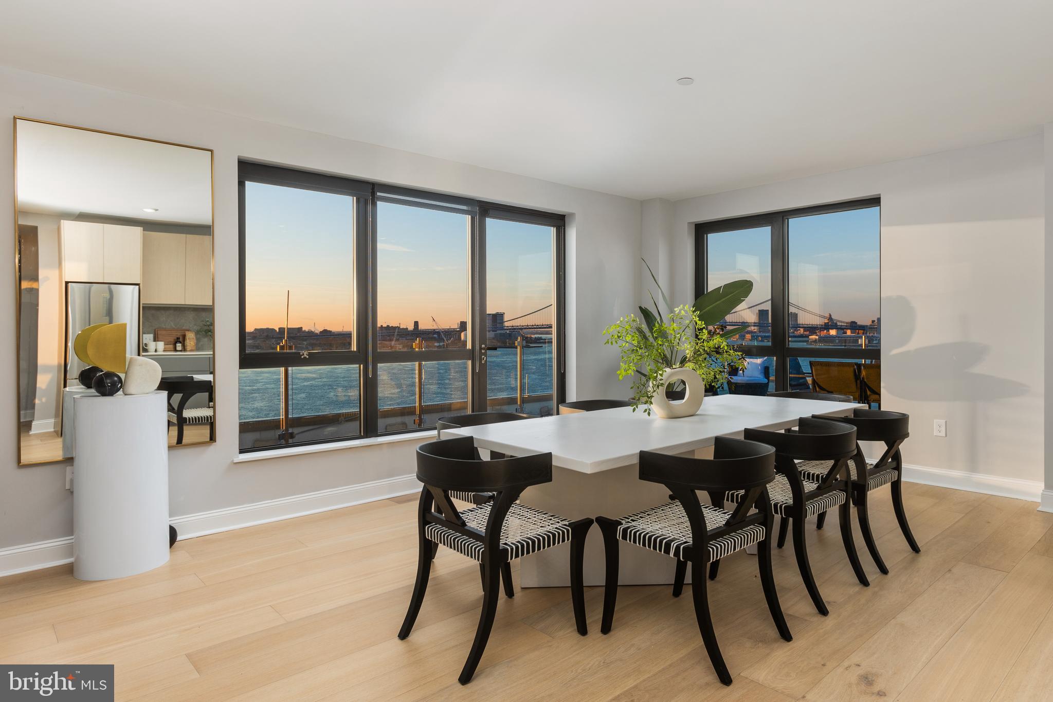 1325 North Beach Street, Unit 708 Philadelphia, PA 19125 - Photo 5 of 18 a view of a dining room with furniture and chandelier