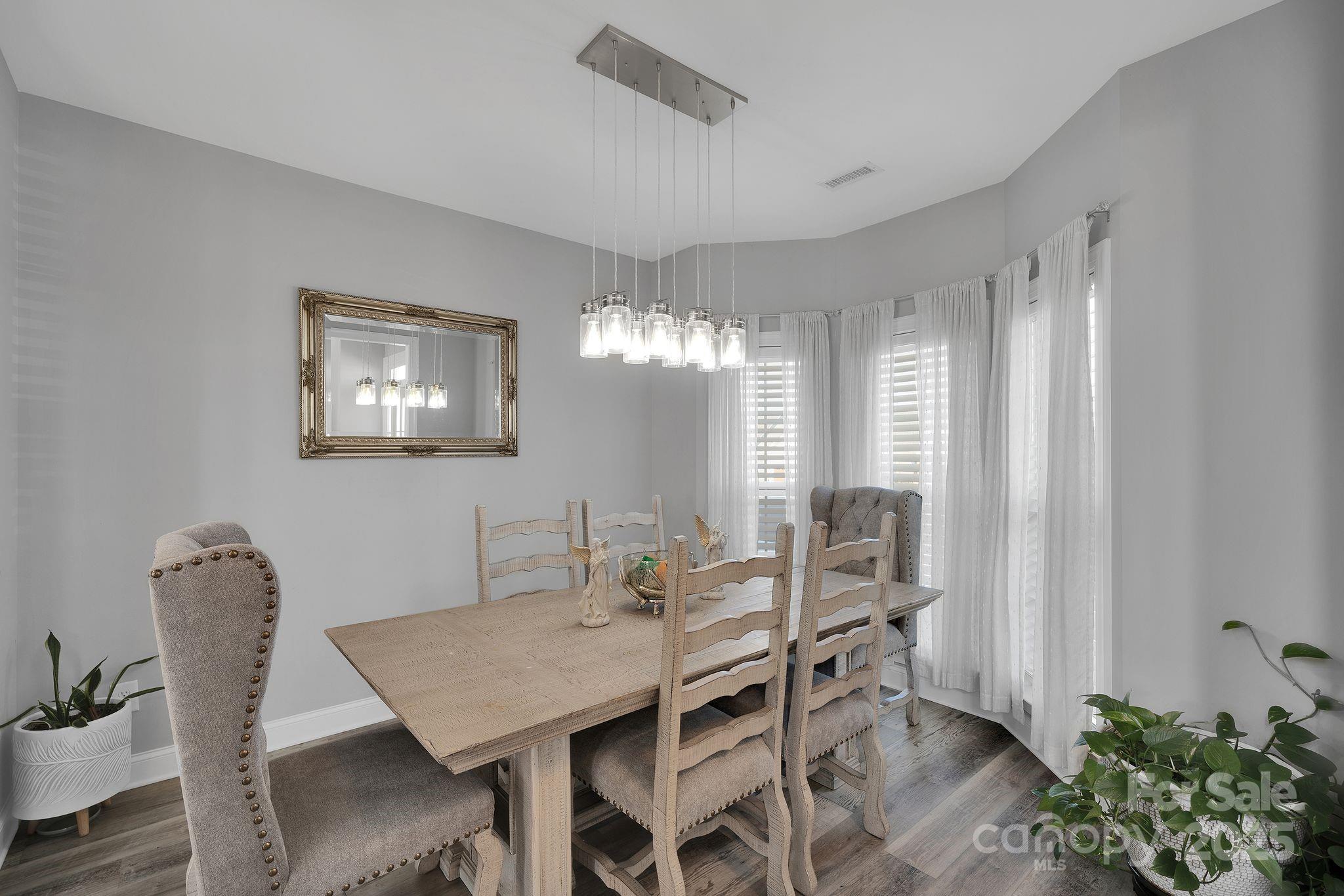 236 Pinnacle Crossing Shelby, NC 28152 - Photo 11 of 39 a view of a dining room with furniture and chandelier
