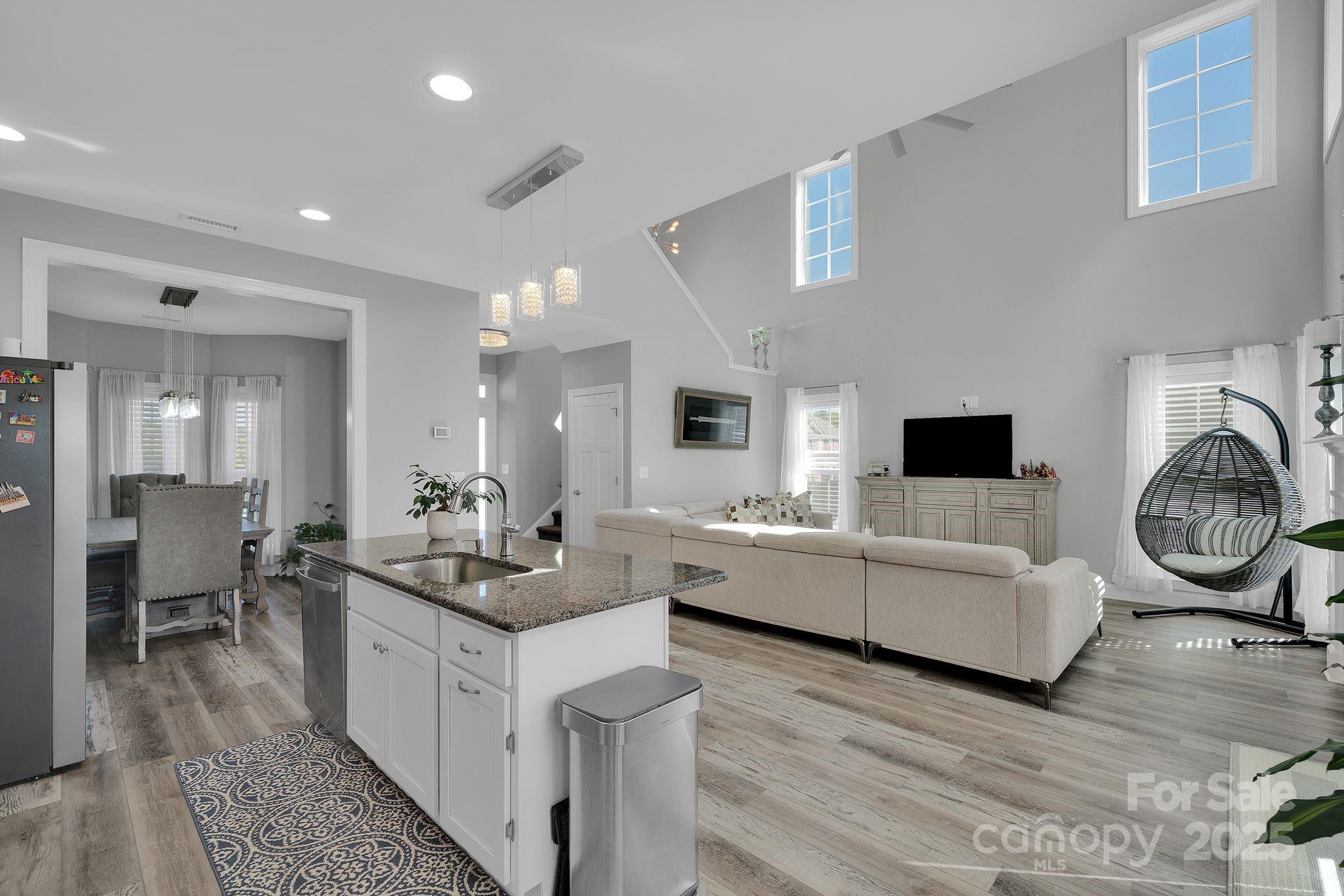 236 Pinnacle Crossing Shelby, NC 28152 - Photo 15 of 39 a living room with furniture and a flat screen tv