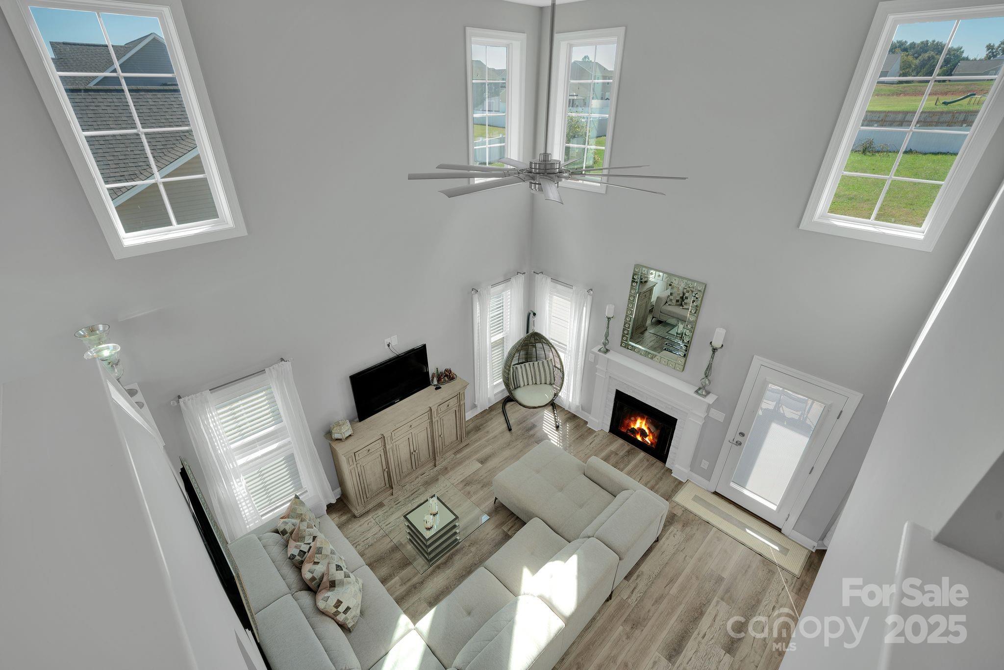 236 Pinnacle Crossing Shelby, NC 28152 - Photo 22 of 39 a living room with furniture and a fireplace