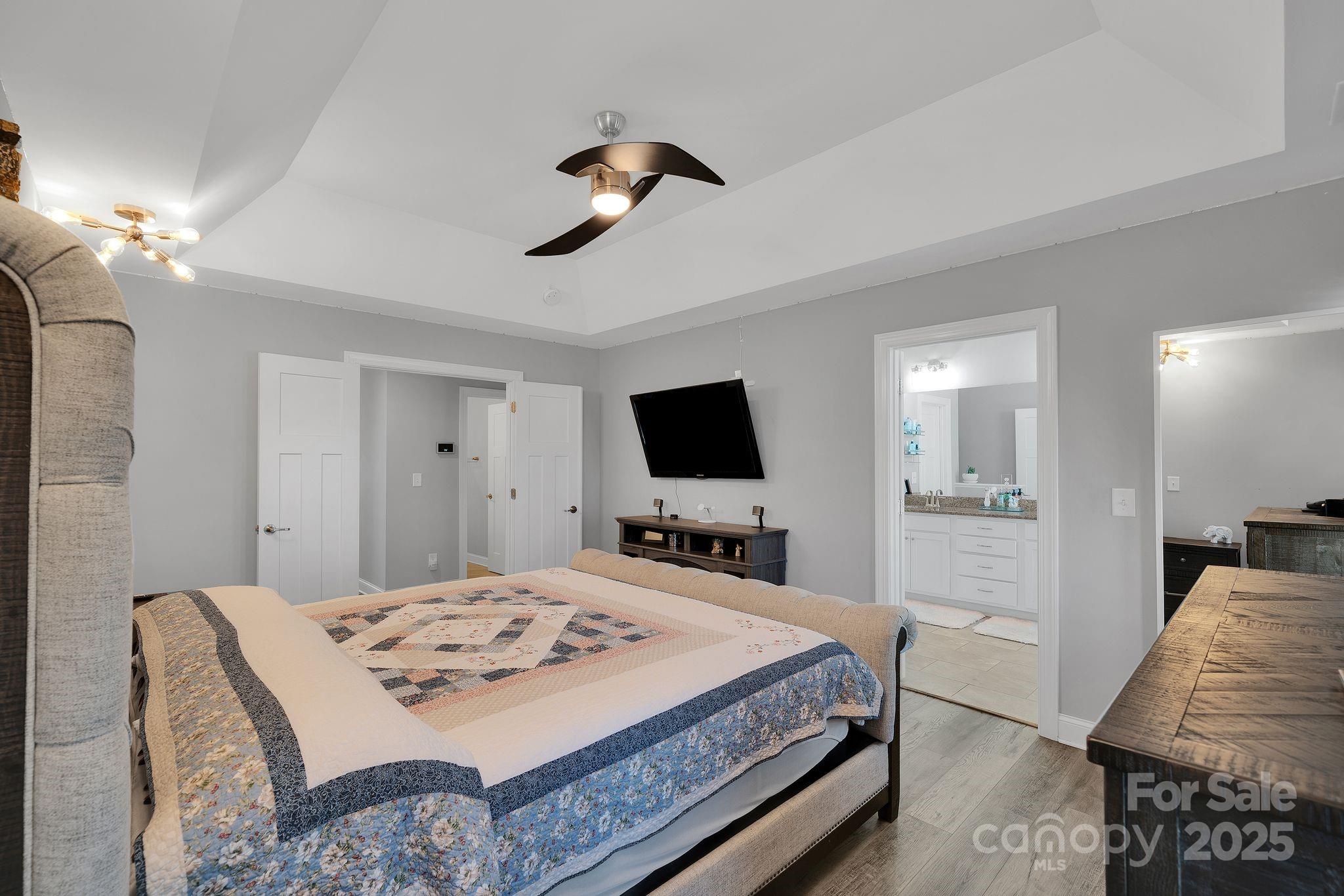 236 Pinnacle Crossing Shelby, NC 28152 - Photo 26 of 39 a living room with a bed furniture and a flat screen tv