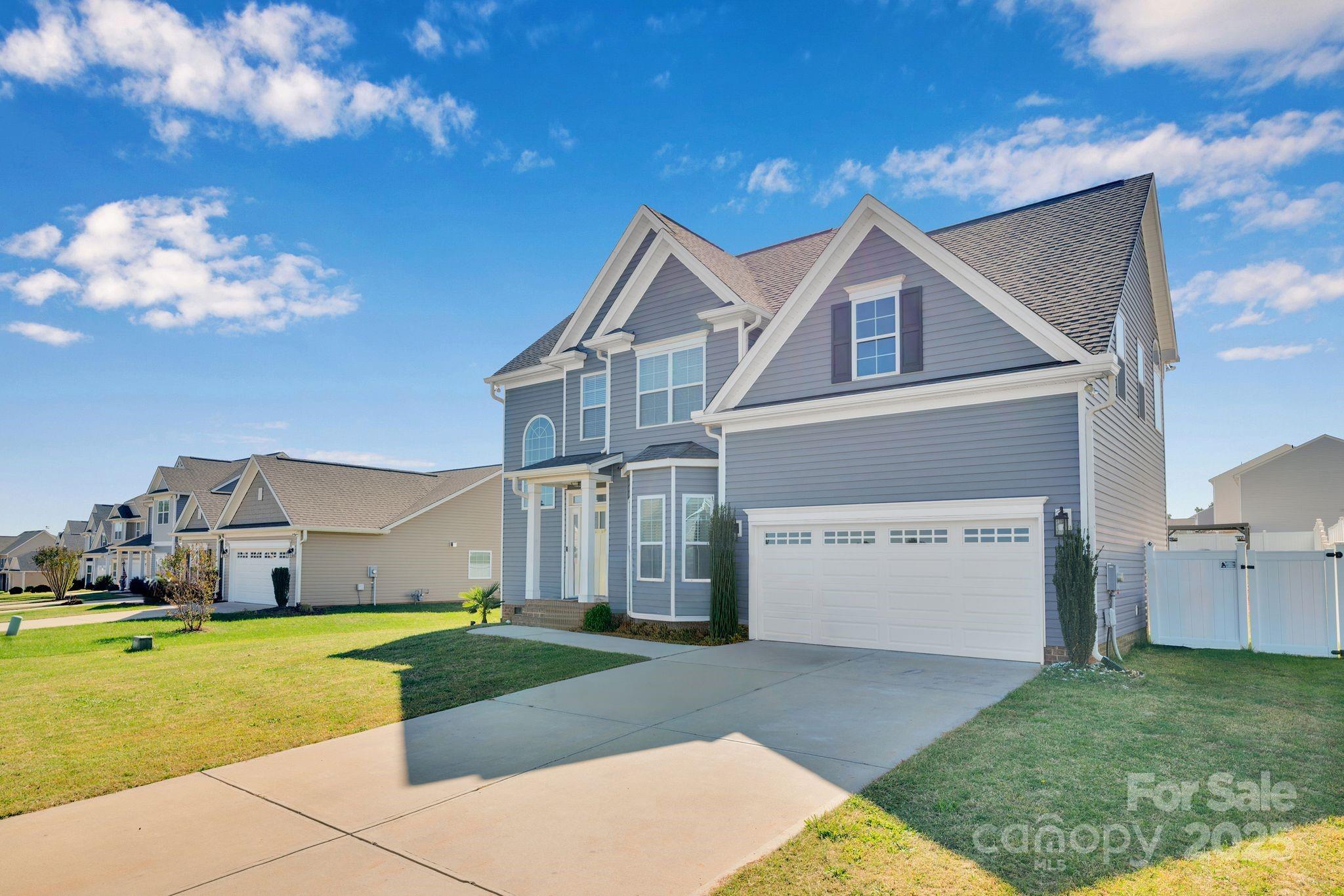 236 Pinnacle Crossing Shelby, NC 28152 - Photo 3 of 39 a house view with a garden space