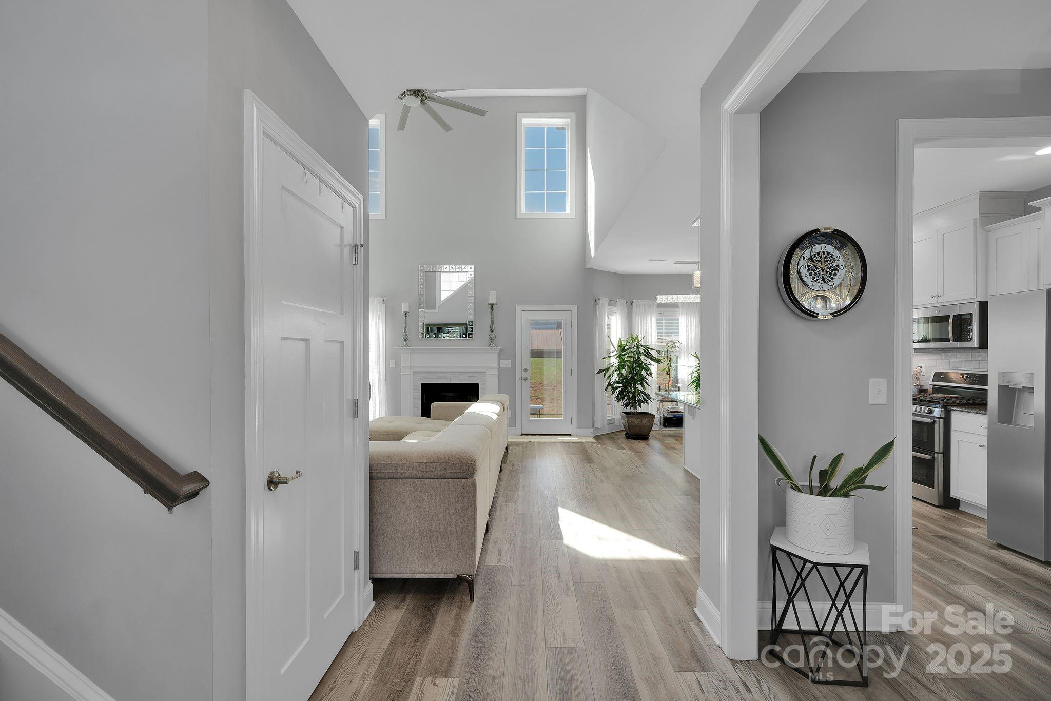 236 Pinnacle Crossing Shelby, NC 28152 - Photo 8 of 39 a view of living room filled with furniture and wooden floor