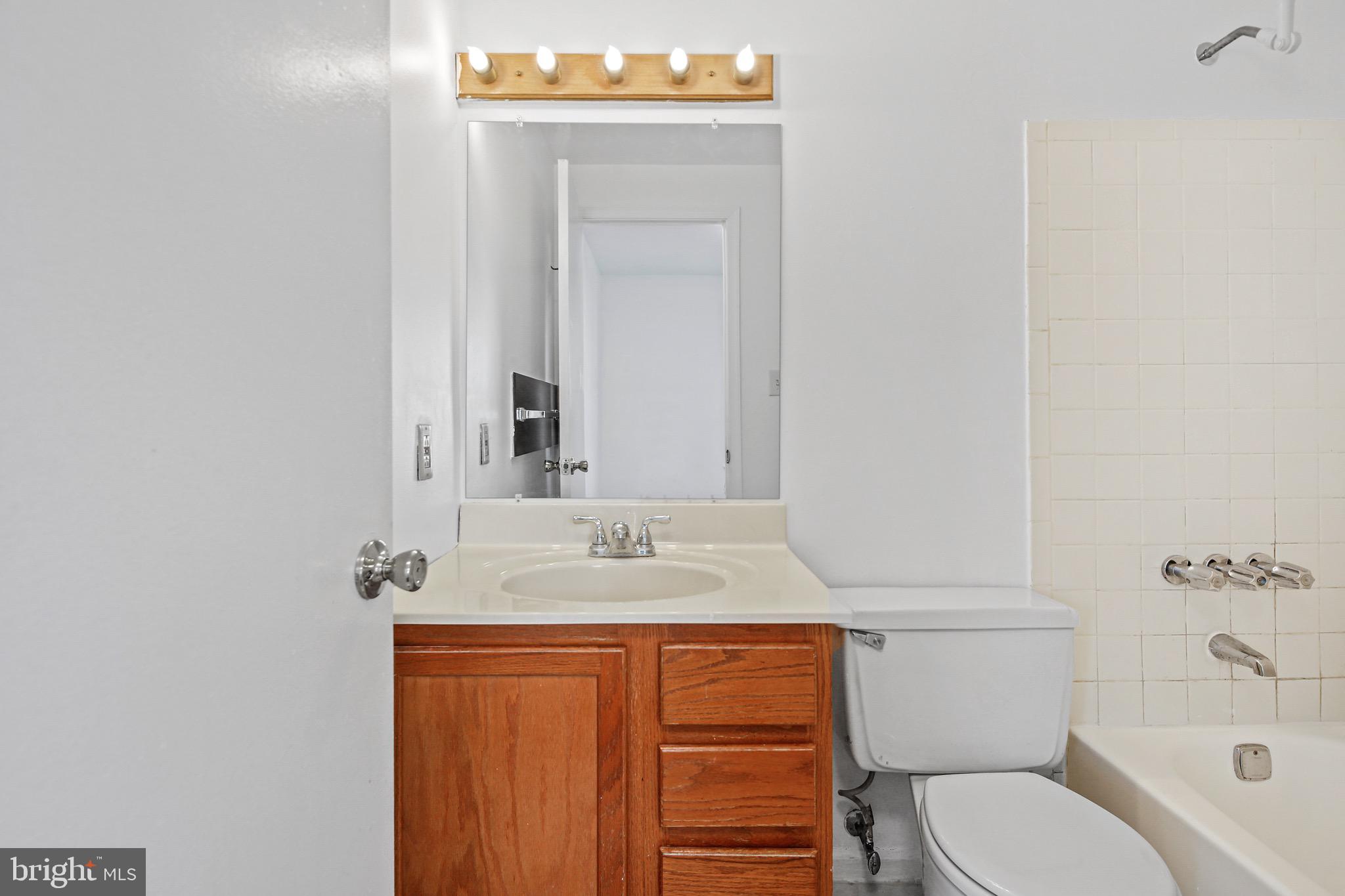 20 Bantry Court Rosedale, MD 21237 - Photo 10 of 14 Hall Bathroom with Tub