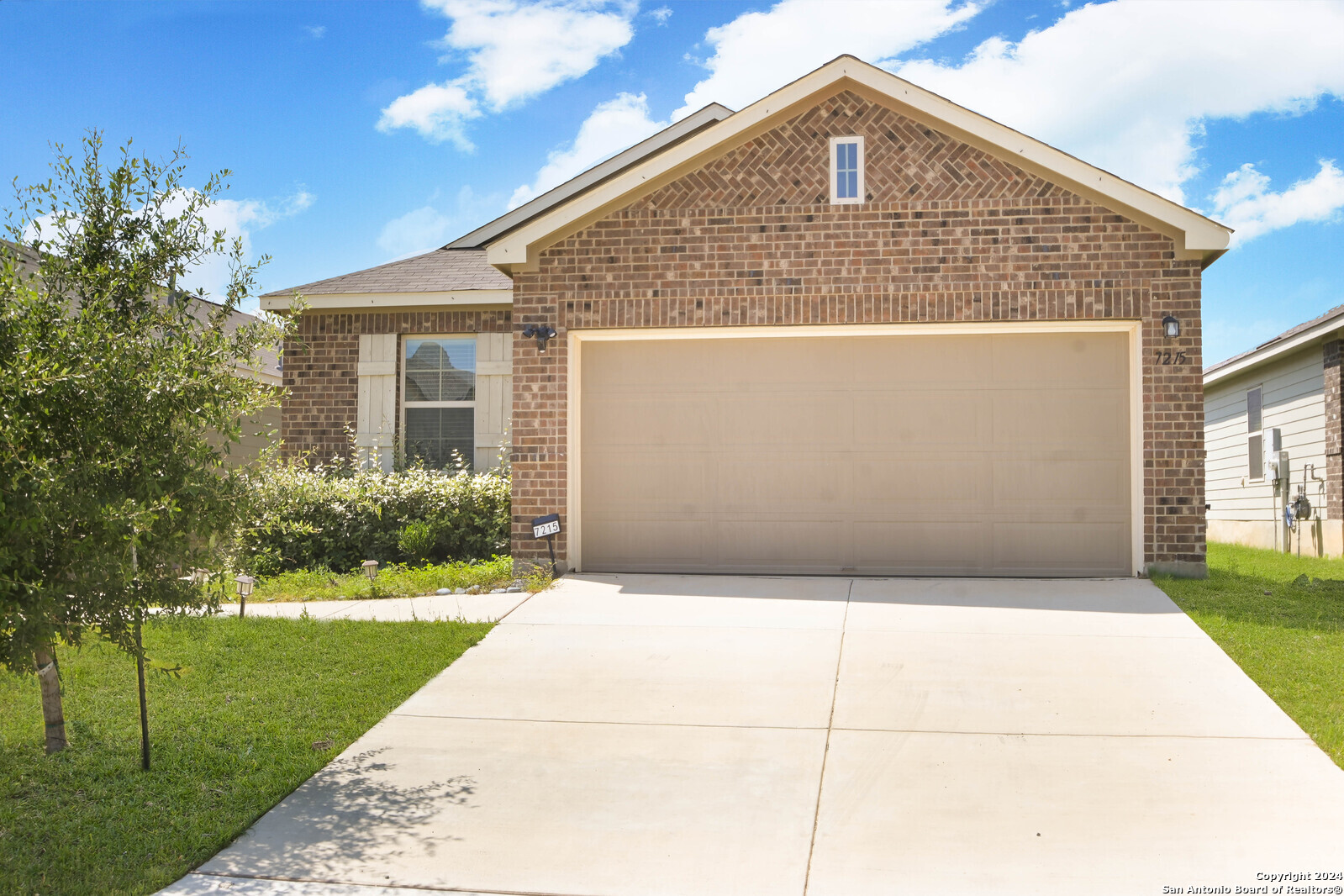 a front view of house with yard