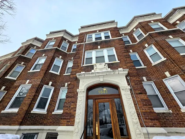 a front view of a multi story building