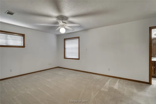 a view of staircase with empty racks