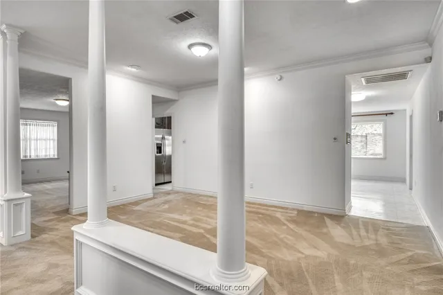 a spacious bathroom with a shower a toilet and sink