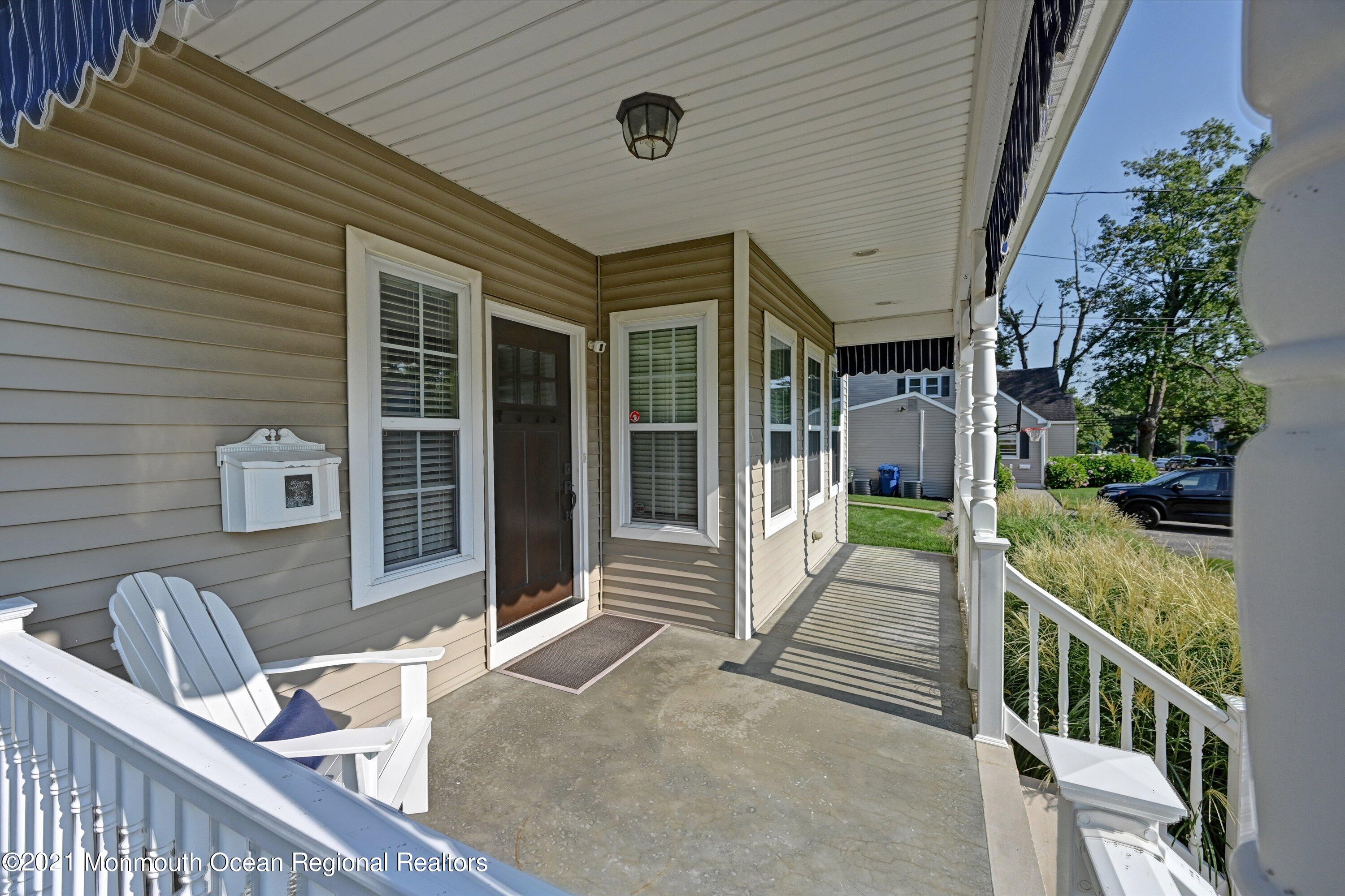 211 Oakhurst Road Oakhurst, NJ 07755 - Photo 2 of 47 Covered Front Porch