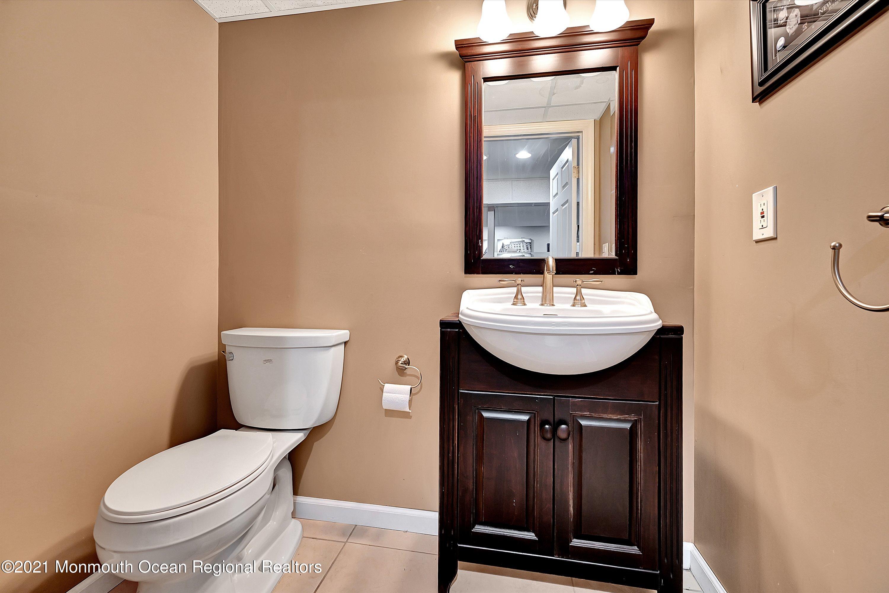 211 Oakhurst Road Oakhurst, NJ 07755 - Photo 35 of 47 Powder Room