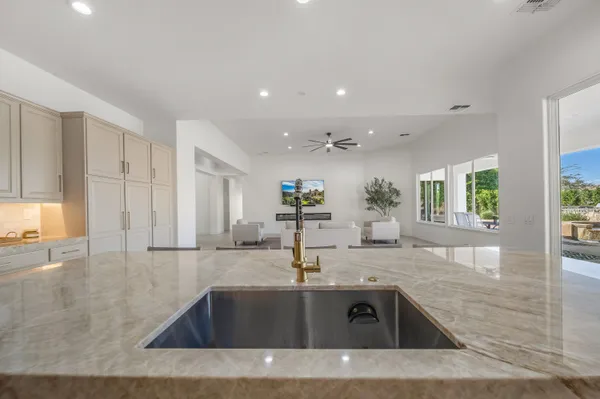 a kitchen with counter top space cabinets and stainless steel appliances