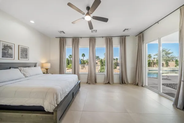 a view of a swimming pool in back yard