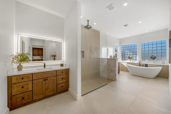 an aerial view of a house with a ocean view