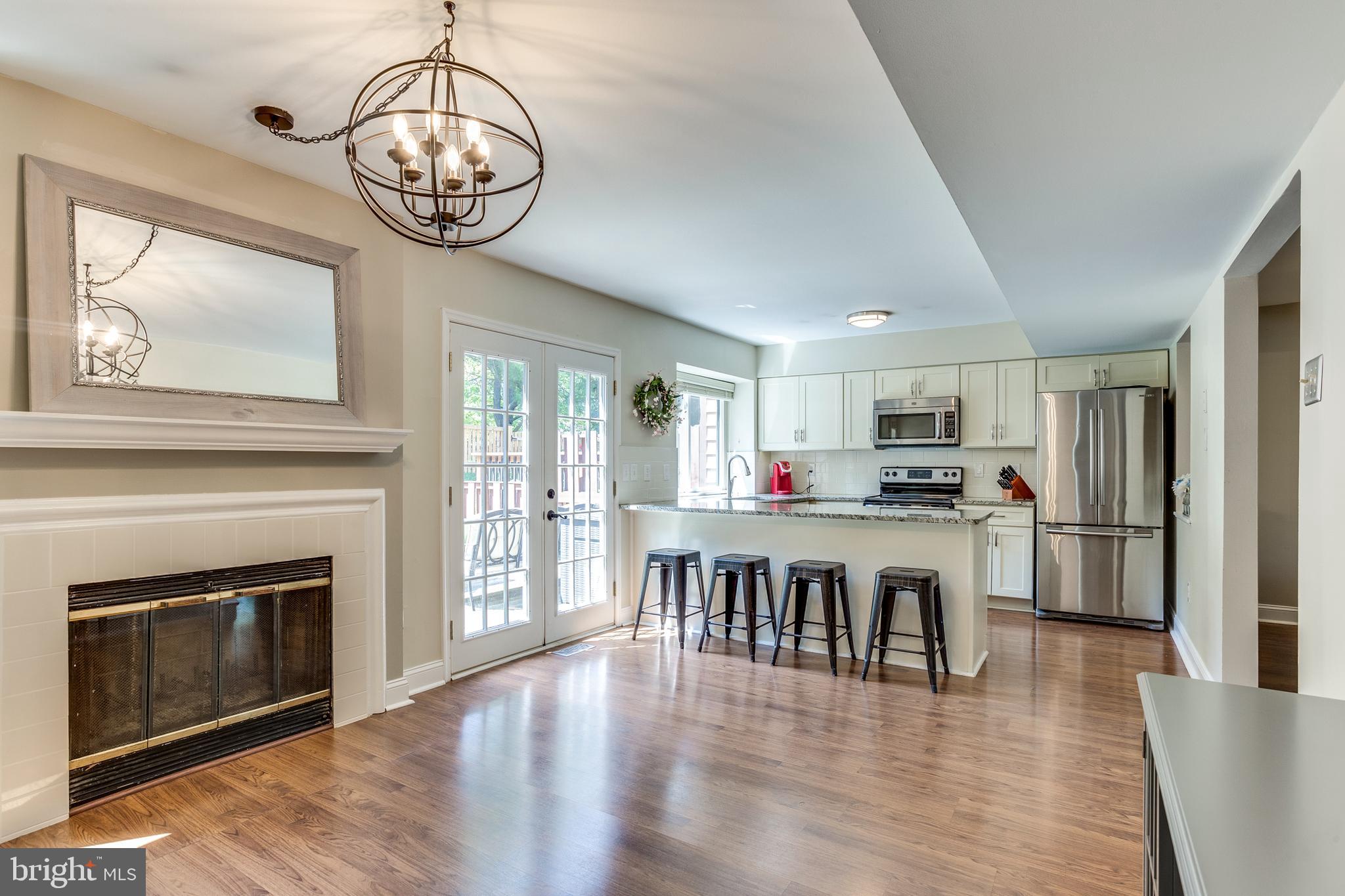 6336 Red Haven Road Columbia, MD 21045 - Photo 11 of 34 Eat-In Kitchen & Dining Area w/ Gas Fireplace
