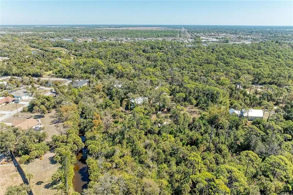 a kitchen with stainless steel appliances a stove a refrigerator and a refrigerator