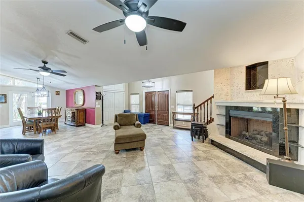 a bathroom with a double vanity sink mirror and shower