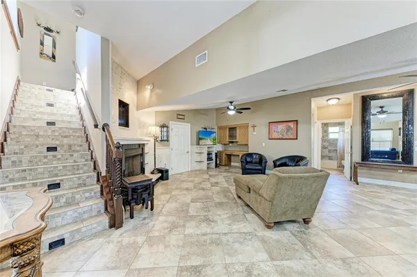 a view of balcony with furniture