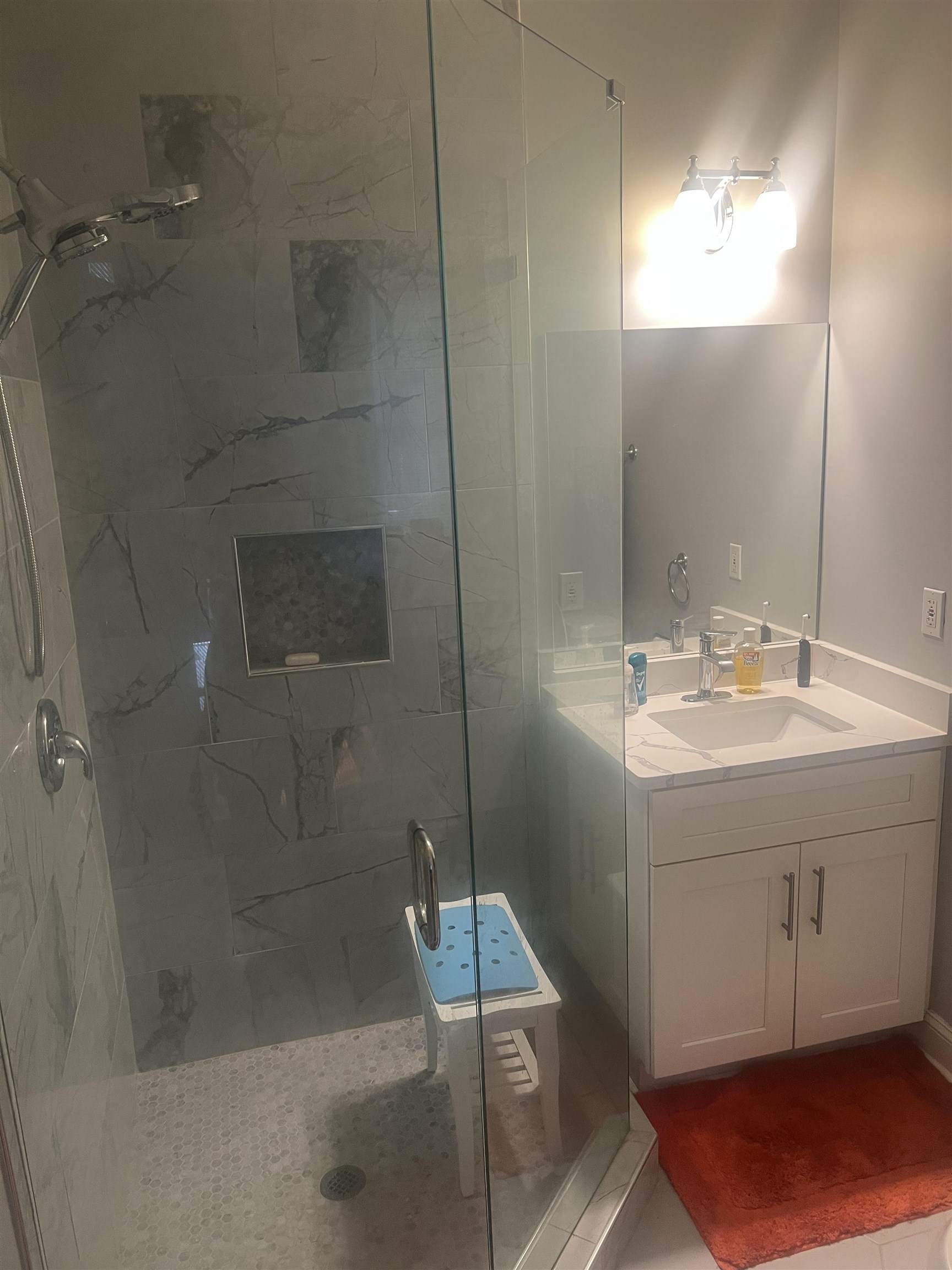 1353 Harbert Avenue Memphis, TN 38104 - Photo 8 of 18 a bathroom with a sink and mirror