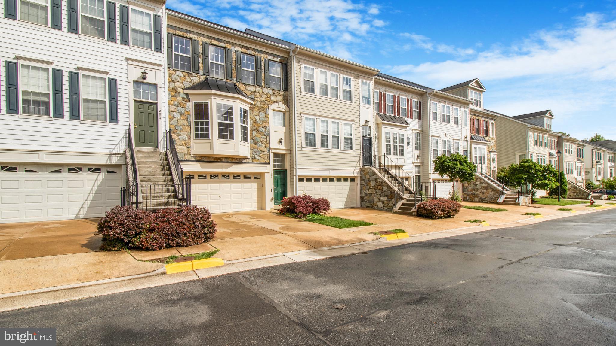 2080 Capstone Circle Herndon, VA 20170 - Photo 2 of 38 a view of a building with a street