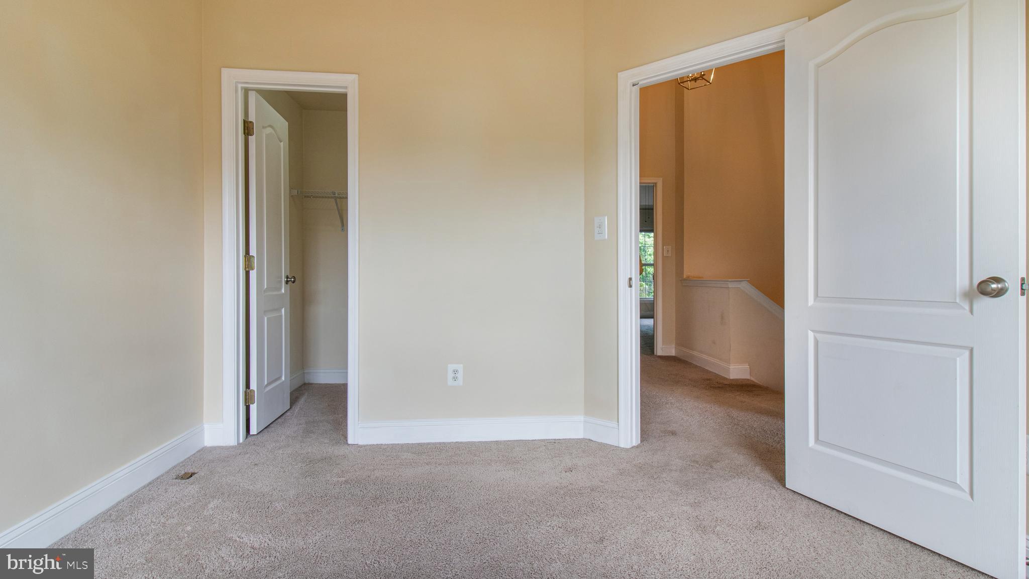 2080 Capstone Circle Herndon, VA 20170 - Photo 25 of 38 an empty room with closet and a bathroom