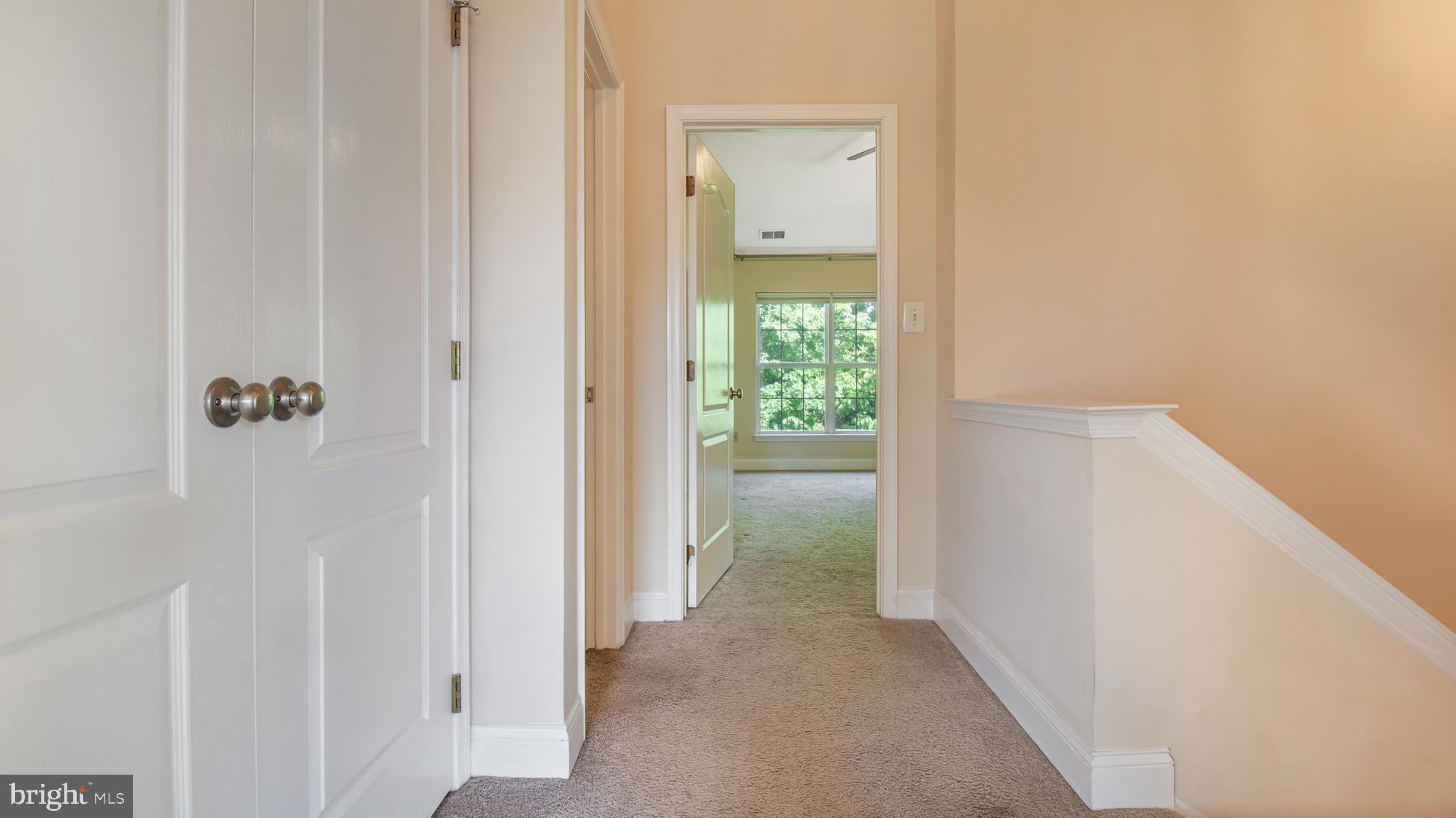 2080 Capstone Circle Herndon, VA 20170 - Photo 28 of 38 a view of a bathroom from a hallway