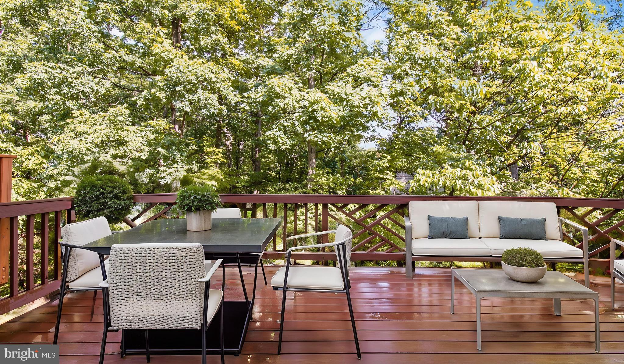 2080 Capstone Circle Herndon, VA 20170 - Photo 35 of 38 a balcony with wooden floor and furniture