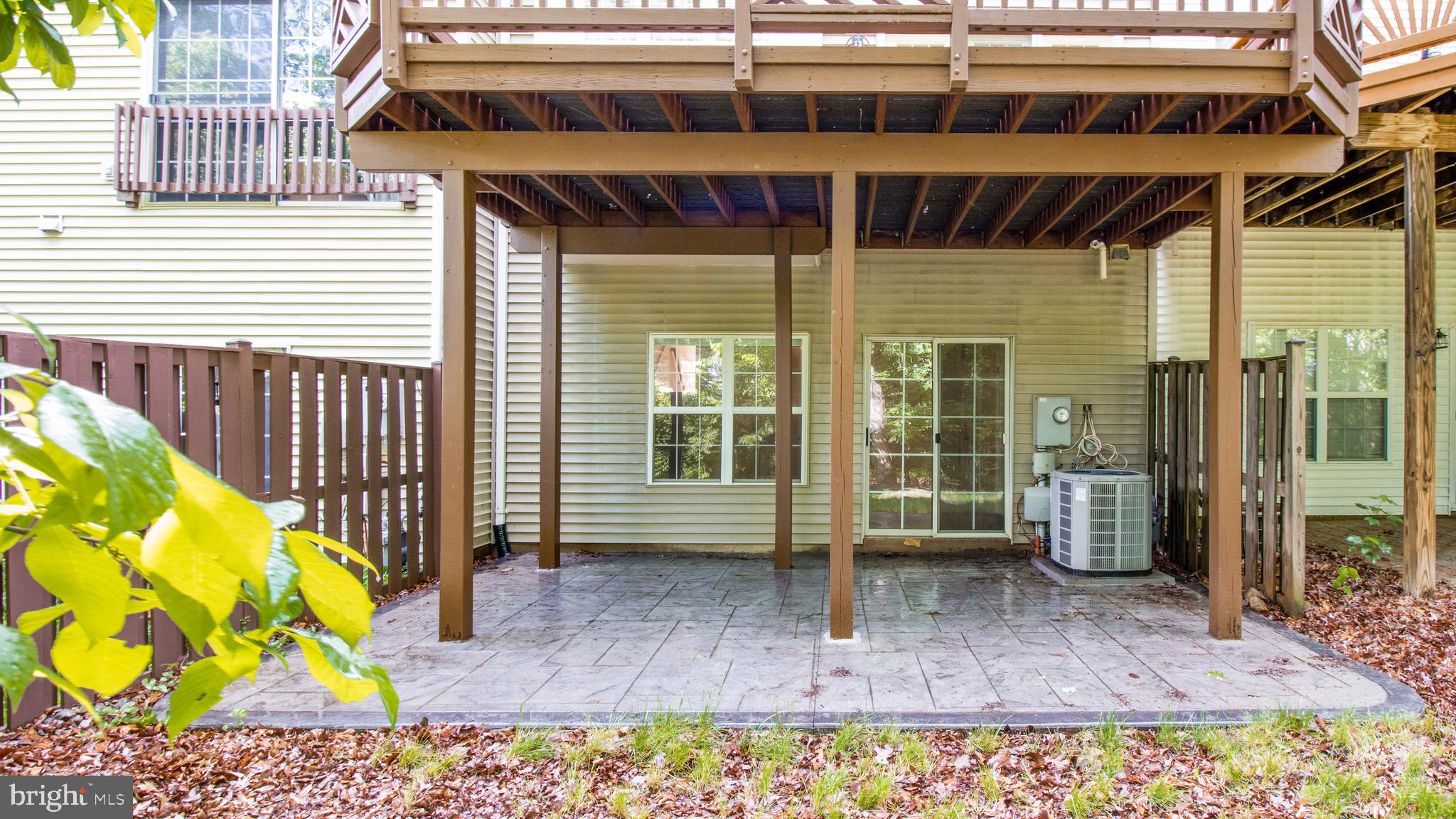 2080 Capstone Circle Herndon, VA 20170 - Photo 36 of 38 a front view of a house with a large window