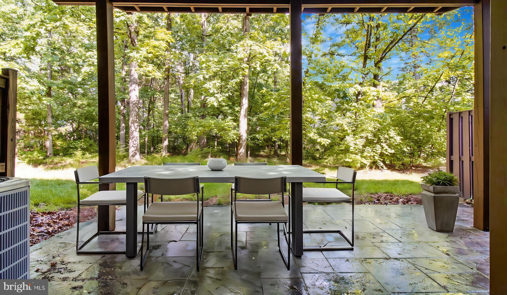 2080 Capstone Circle Herndon, VA 20170 - Photo 37 of 38 a view of a porch with chairs and backyard
