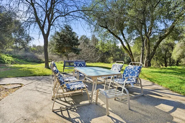 a view of a golf course with a lake
