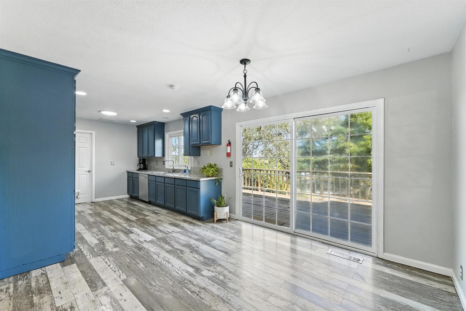 2422 Cheyenne Road Copperopolis, CA 95228 - Photo 13 of 64 a kitchen with stainless steel appliances a large counter top a stove and a refrigerator